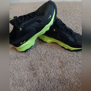 Nike Black and Green Sneakers with Modern Design and Thick Sole